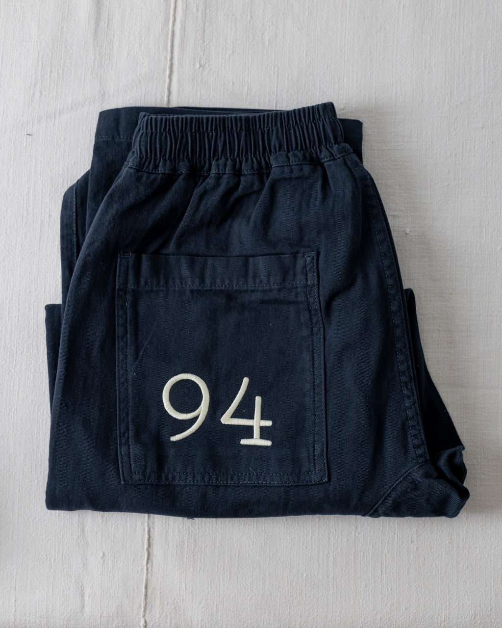 Service Works x Kitchen 94 dark navy trousers